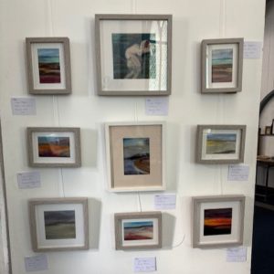 Small framed landscape and abstract artworks displayed at the 2025 hART Exhibition in Hythe, Kent.