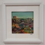 Dungeness textile landscape by Kent artist Carol Dixon featuring coastal vegetation and a distant building
