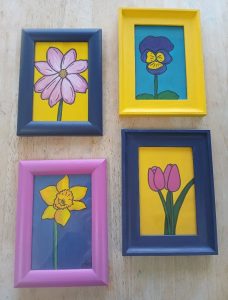 Four colourful flower paintings by Fiona Yorke-Saville featuring a daffodil, pansy, tulips and pink flower.