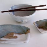 Handmade stoneware tableware by Mary Sampson including bowl and dishes with blue grey glazes